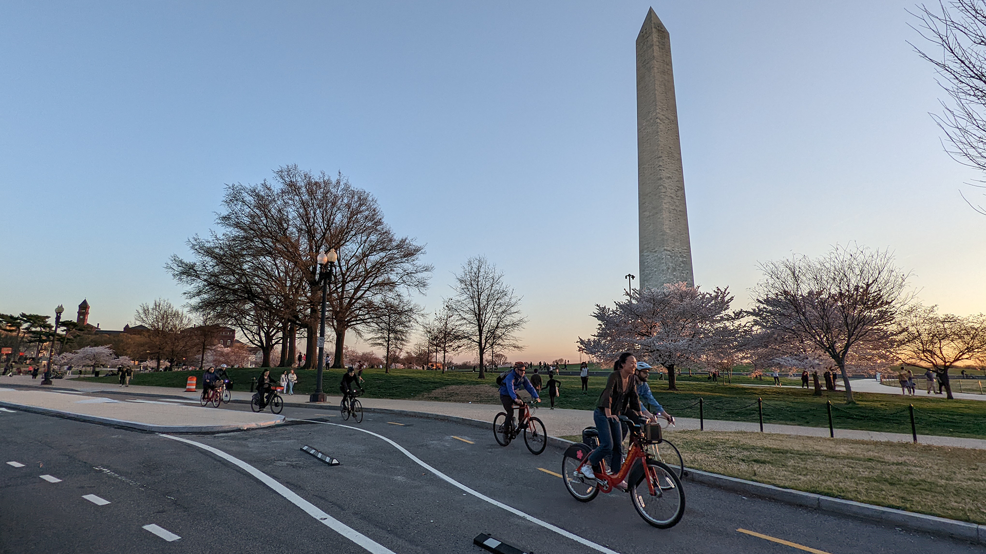 People biking and walking on bike lanes post construction on 15th street in Washington D.C.
