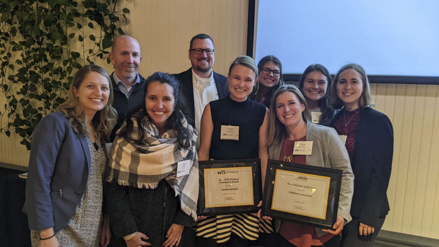 Group of Kittelson & Associates staff accepting award for WTS Portland Employer of the Year