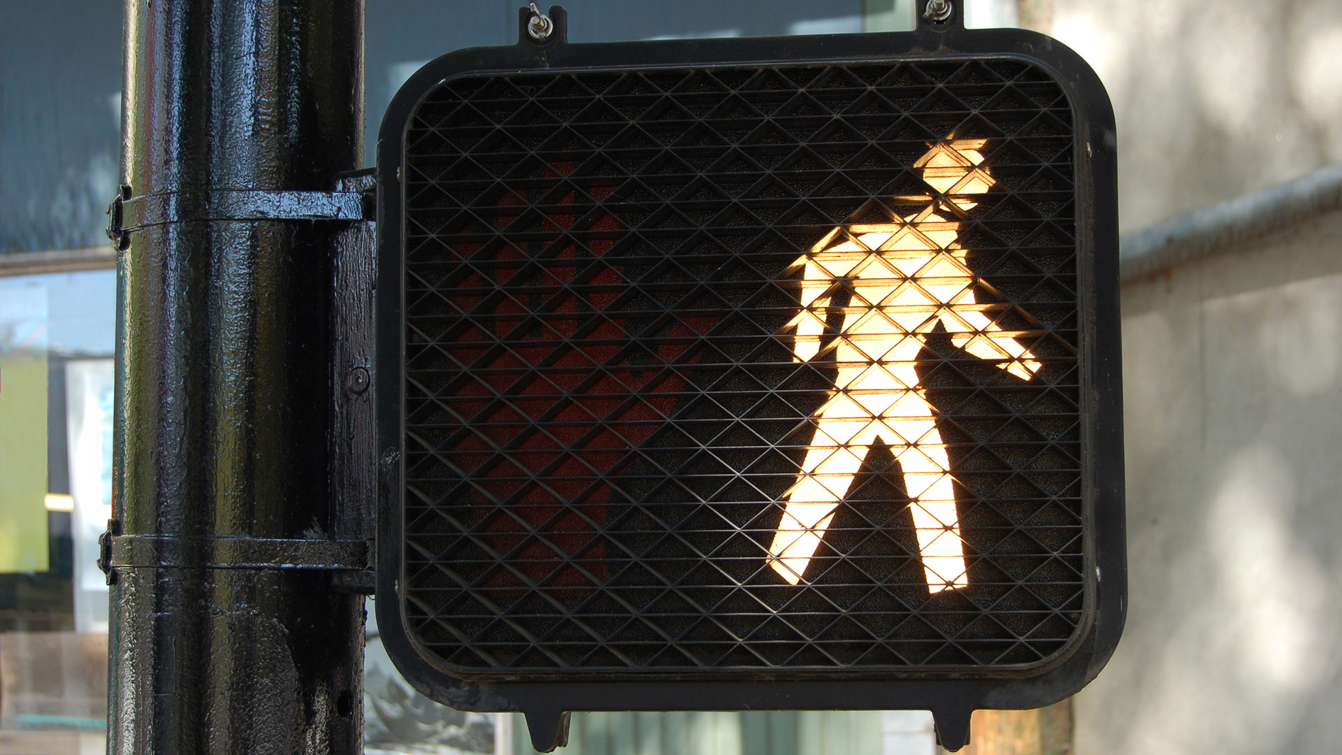 Close-up of pedestrian walk sign