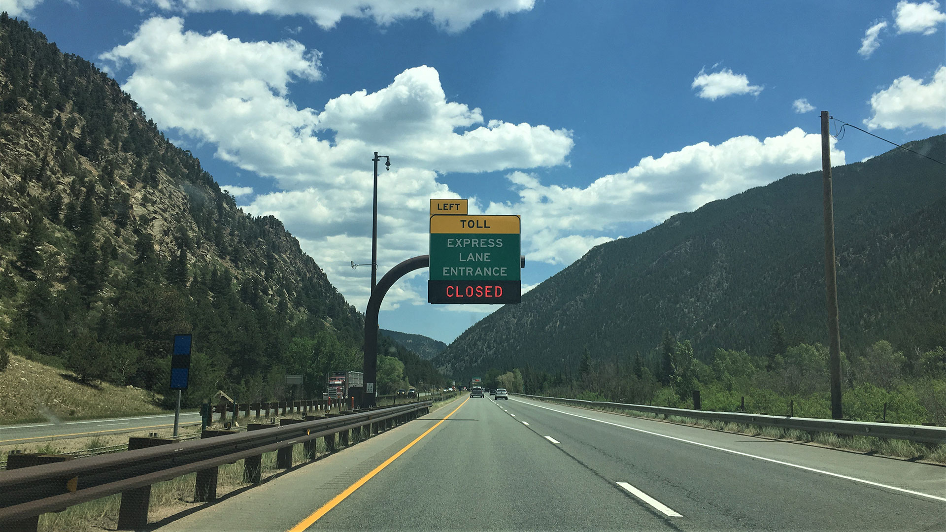 Freeway sign showing that the express lane entrance is closed