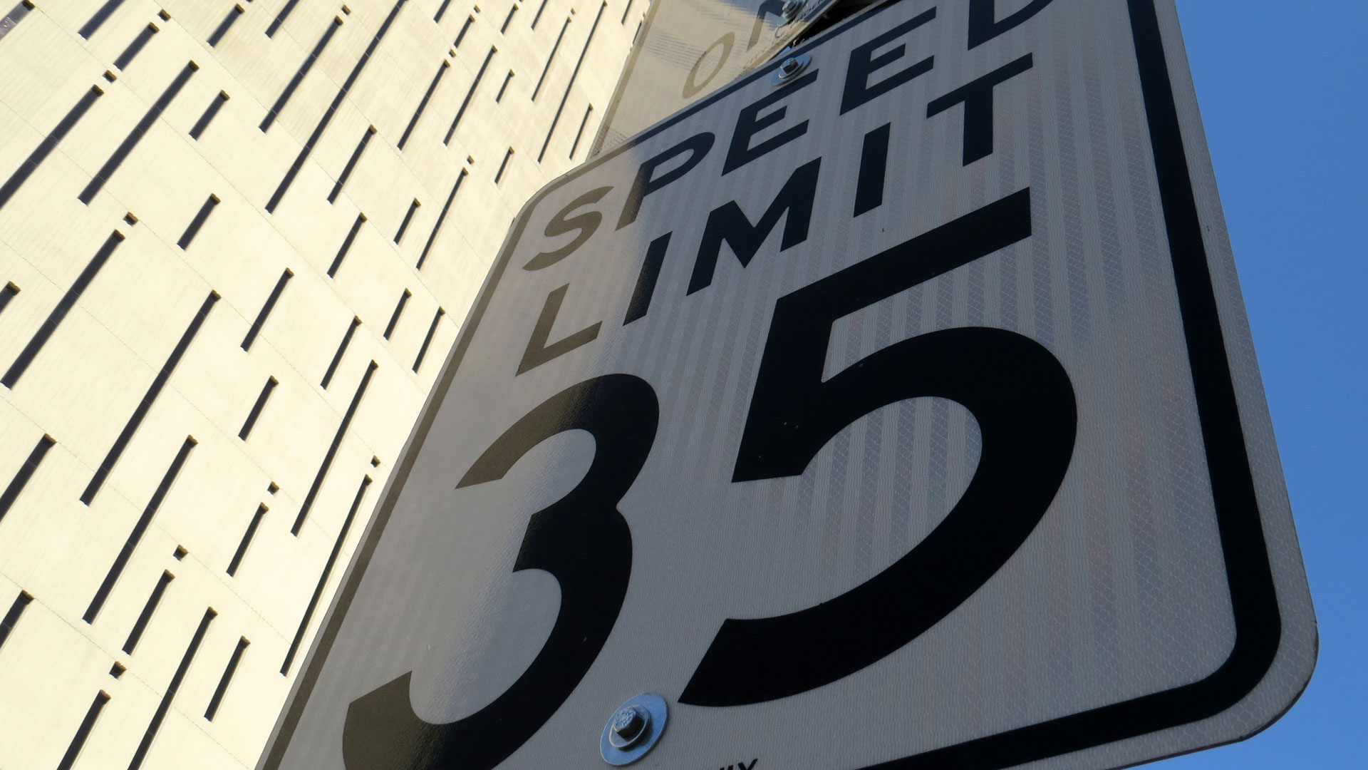 Close-up photo of a 35 miles per hour speed limit sign