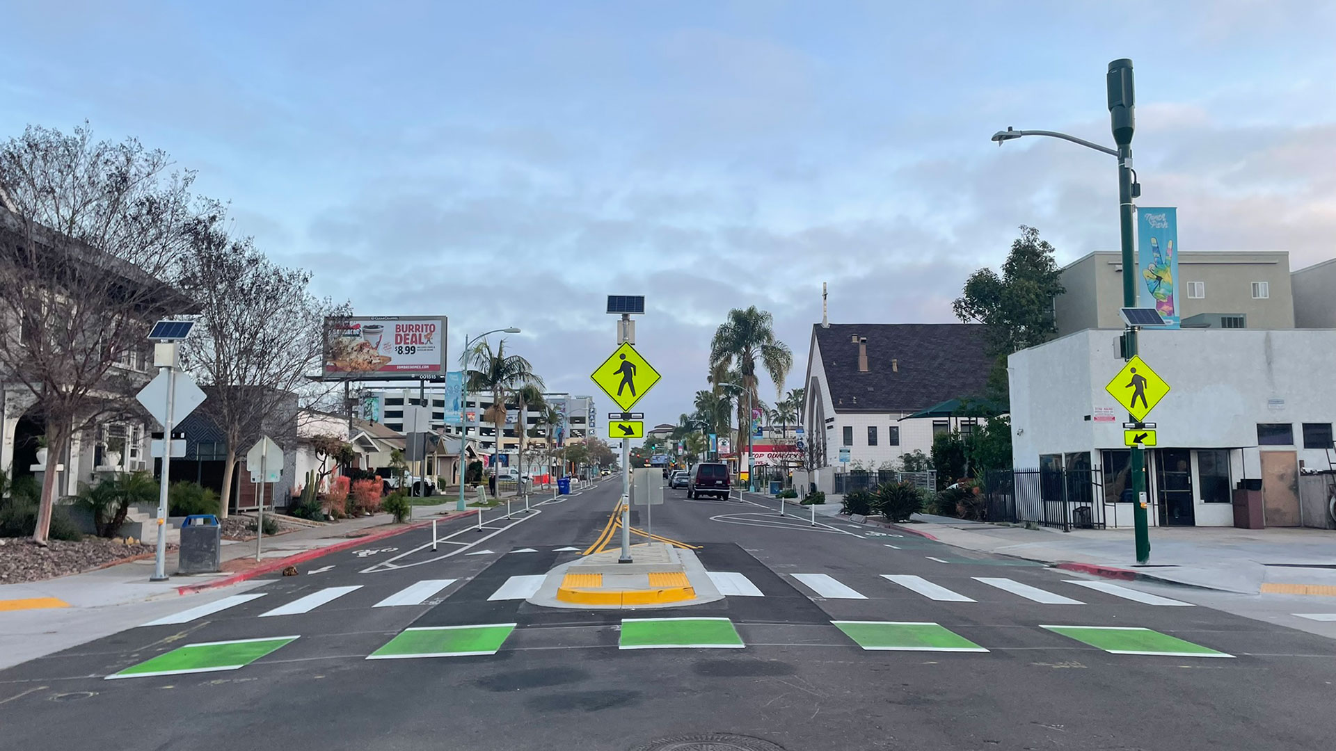 Crosswalk with rectangular rapid flashing beacons (RRFBs)