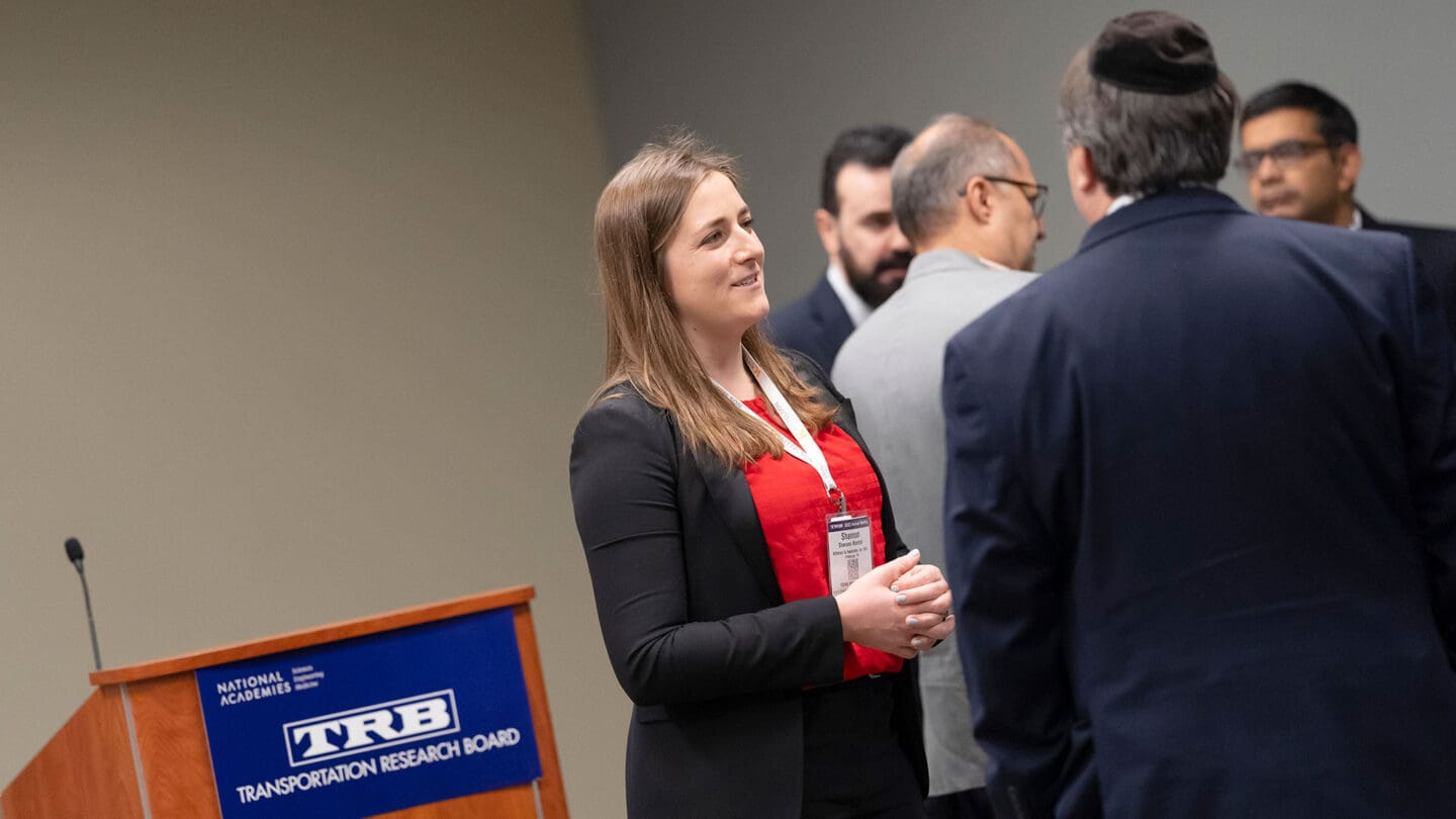 Two people talking at a lectern session at a TRB Annual Meeting