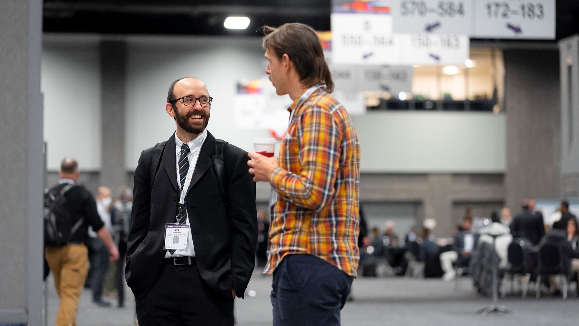 Two people talking at a poster session at a TRB Annual Meeting