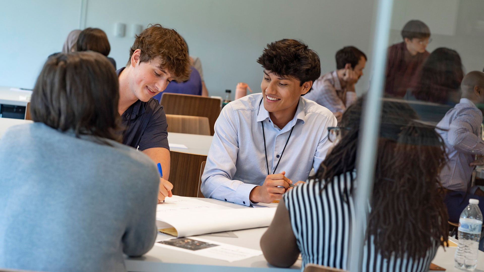 Kittelson interns working at a table together