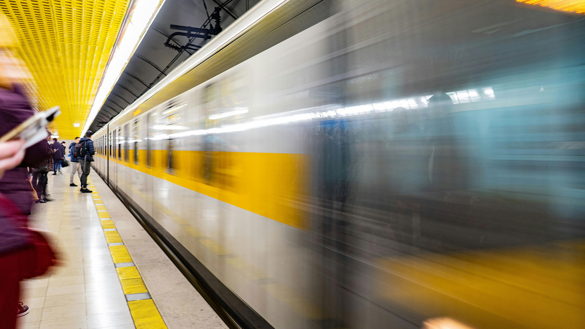 Time lapse photo of people waiting for train