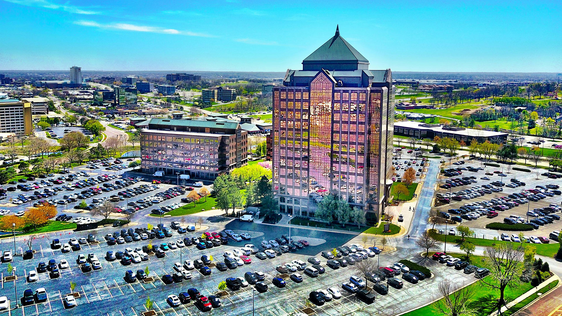 A building in Overlook Park, Kansas surrounded by parking spots.