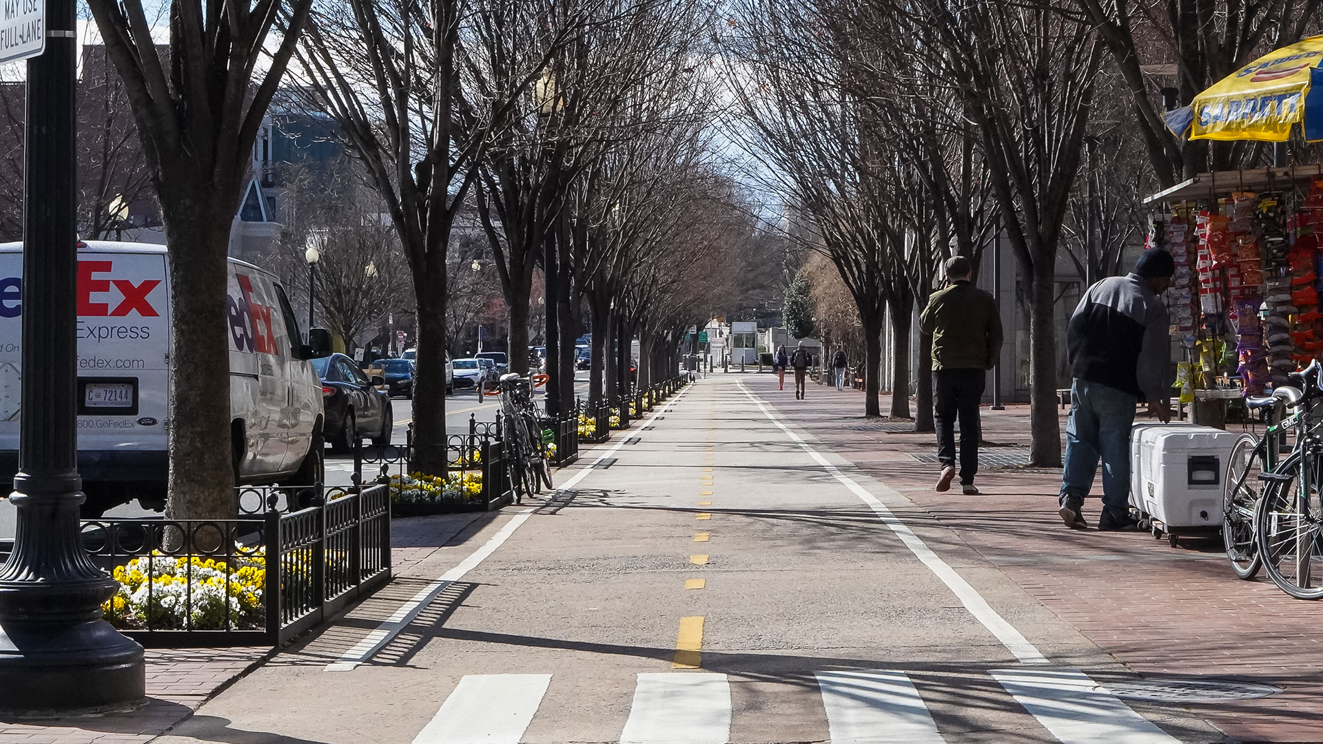 Two-way cycle track running through a city